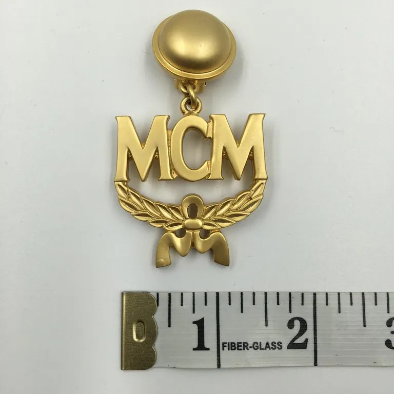 MCM Wreath Logo Matte Gold Tone Clip On Earrings